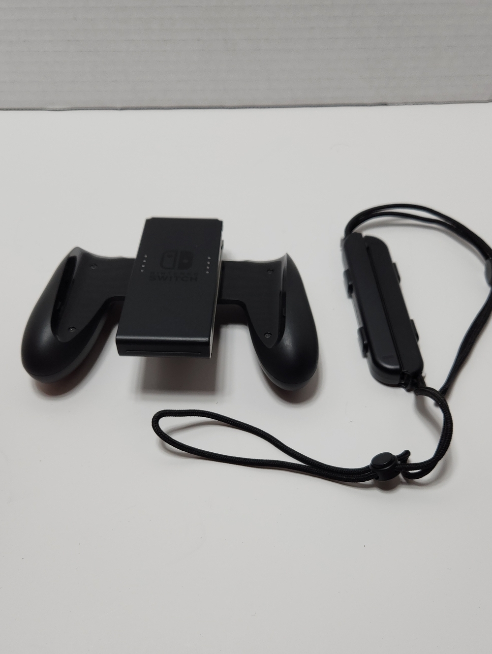 Nintendo Black Joy-Con Grip with Wrist Strap